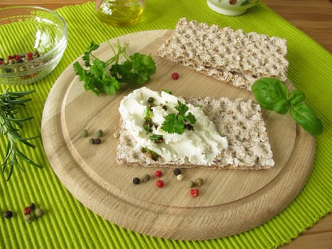 Cream goat cheese on crispbread