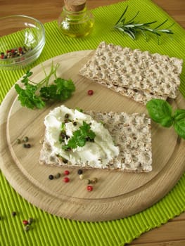 Cream goat cheese on crispbread