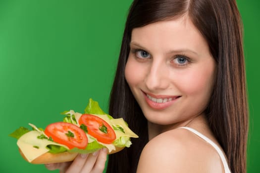Healthy lifestyle - woman enjoy cheese tomato sandwich