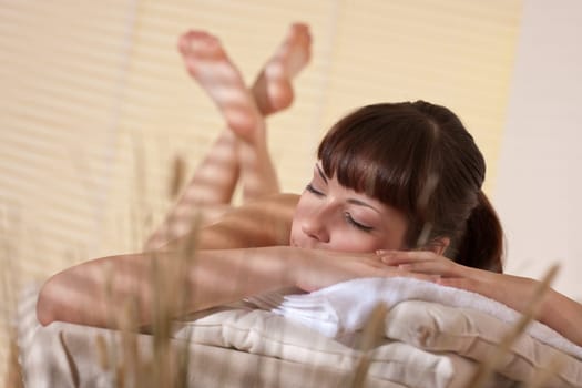 Spa - Young woman at wellness therapy waiting for massage