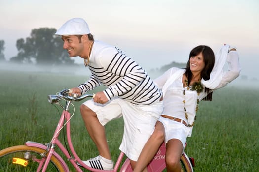 Couple on bicycle