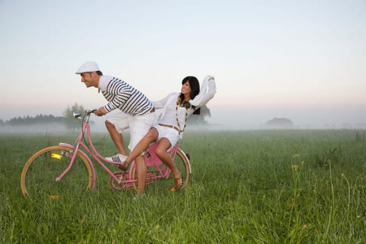 Couple on bicycle