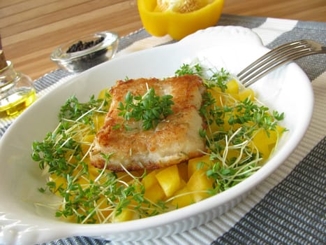 Fish on peppers and cress