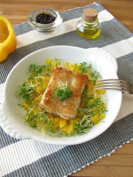 Fish on peppers and cress