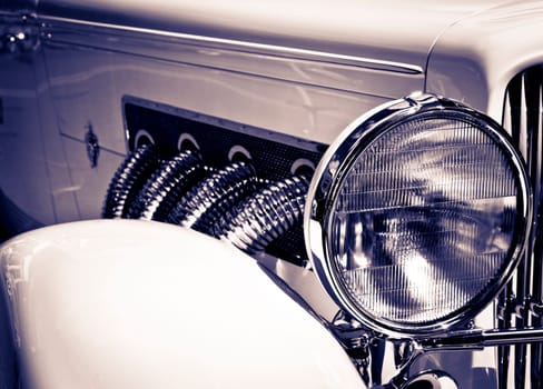 image of the details on the front of a classic automobile