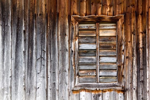 Old wooden hut with window
