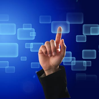 Finger pressing a button on touch screen interface