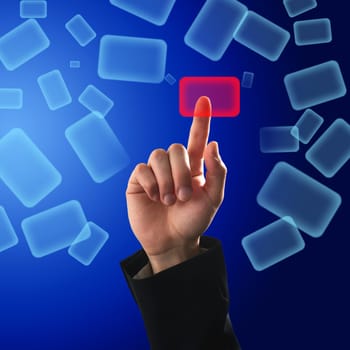 Finger pressing a button on touch screen interface