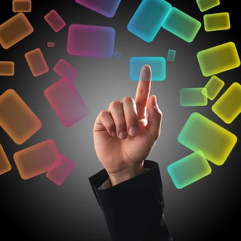 Finger pressing a button on touch screen interface