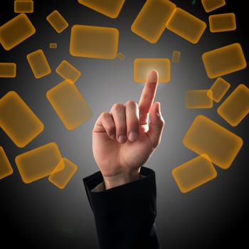 Finger pressing a button on touch screen interface