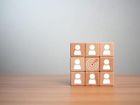 wooden block which prints a target icon and business symbol on white background. Business goals and objectives concept. business competition. business target concept.