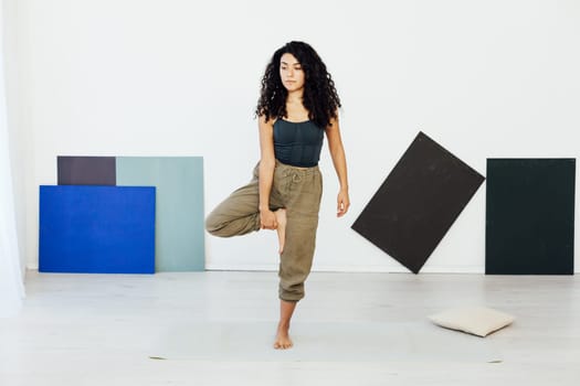 yoga asana shavasana woman doing exercises lotus pose workout in studio