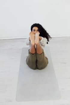 lotus pose training in the studio woman doing yoga