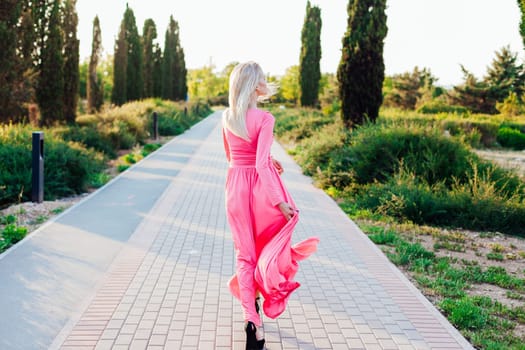 blonde woman walking in the park Outdoor recreation