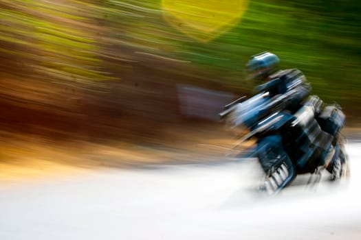 blur of indian biker speeding past