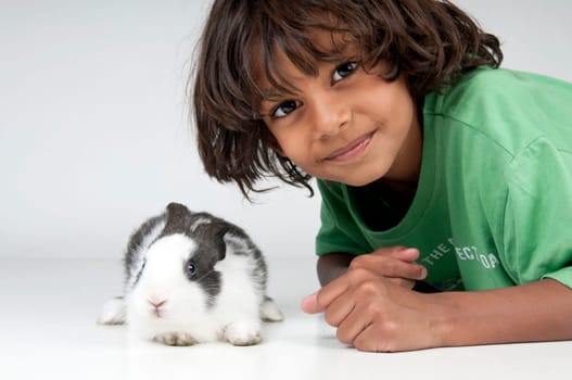 young boy with little rabbit
