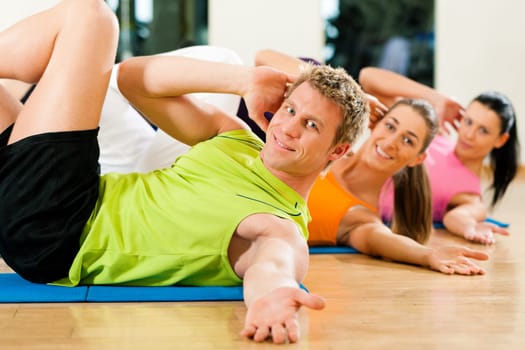Sit-ups in the gym