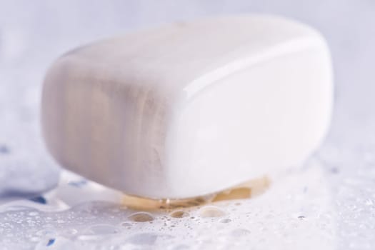 Natural stone mother-of-pearl shines in beautiful colors on a white background