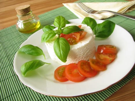 Goat's cream cheese with tomatoes and basil