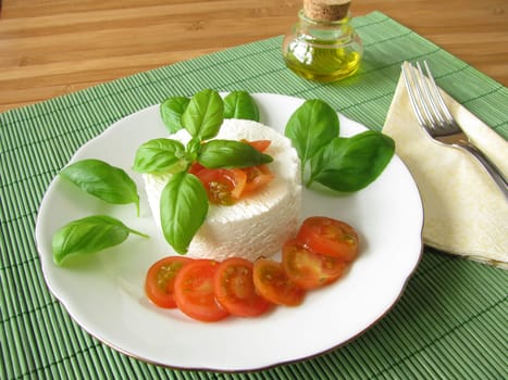 Goat's cream cheese with tomatoes and basil