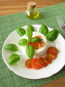 Goat's cream cheese with tomatoes and basil