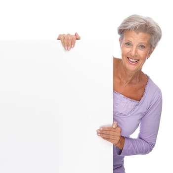 Studio shot of an active and happy senior woman