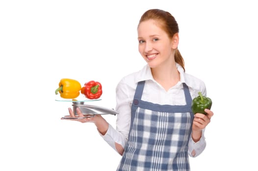 Studio shot of a young woman with a chef's apron