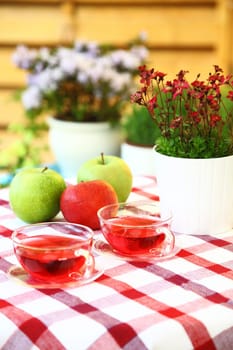 Herbal tea served in the garden - outdoor dining
