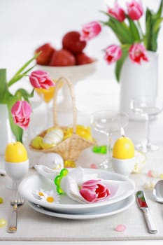 Place seeting for Easter in fresh colors