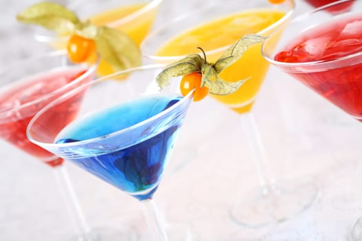 Delicious coctails garnished with fruits