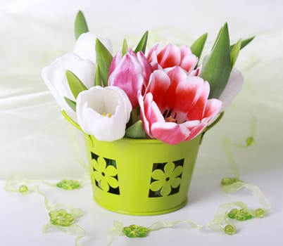 Easter eggs with tulips for spring table decoration