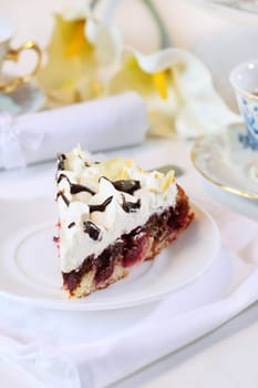 Delicious cherry sponge cake with cream