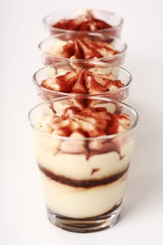 Three Tiramisu desserts in the cup
