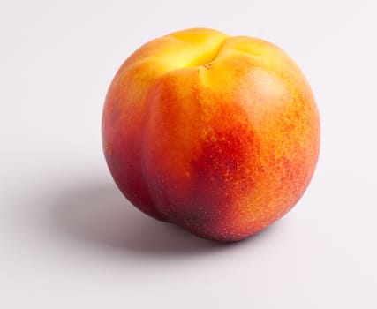 Single Nectarine on White Background