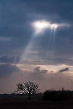 Beam of light from dark clouds