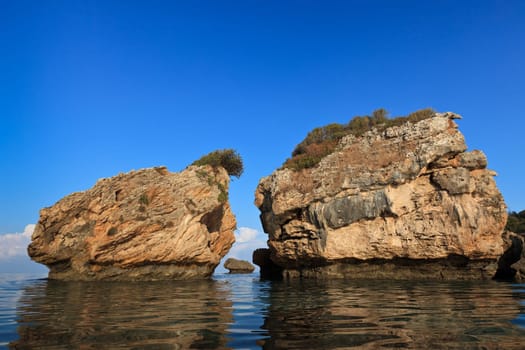 a beautiful reflection of stones in water ,Porto Zoro beach, Zakynthos, Greece