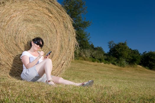 young woman resting on the grass
