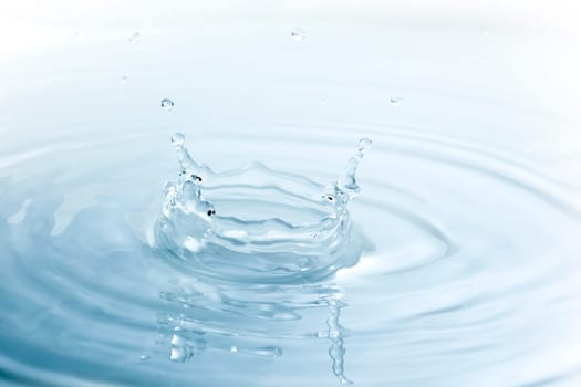 image of the pureness and the simplicity of a color water drop