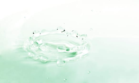 image of the pureness and the simplicity of a color water drop