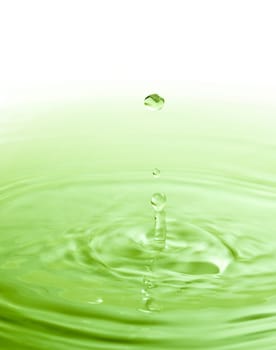 image of the pureness and the simplicity of a color water drop