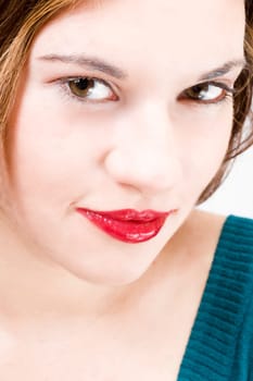 joyful simle of a beautiful young girl with sexy red lips