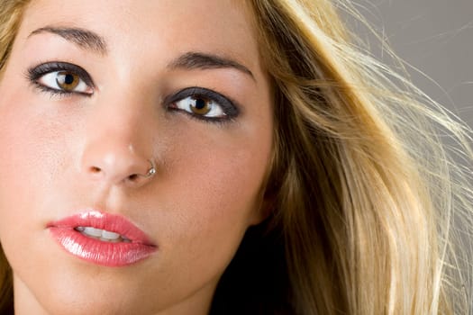 a portrait of a real beautiful young surprised girl