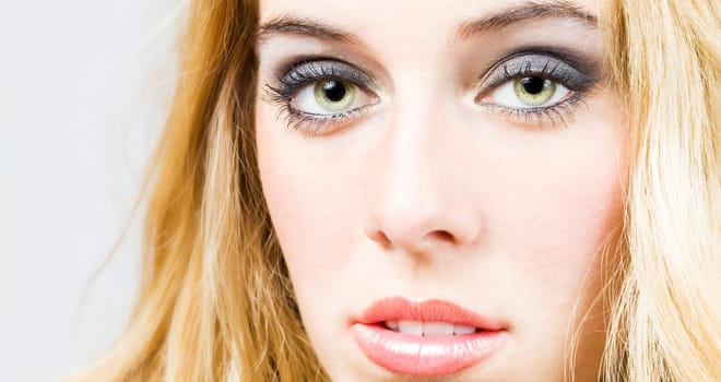 a portrait of a real beautiful young surprised girl