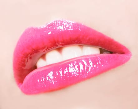 sexy woman lips with pink make up and gloss