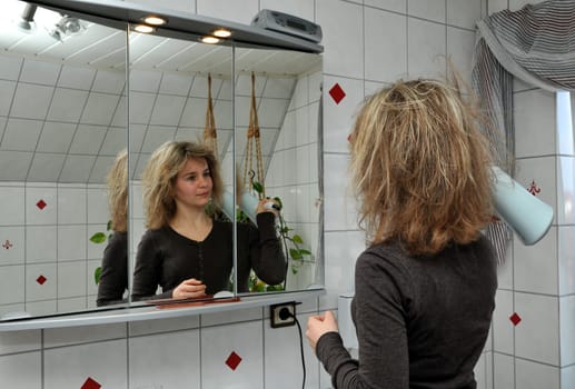 Blow-dry hair