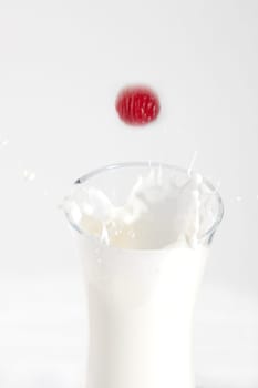 Raspberry falls in milk