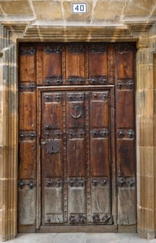 Architectural detail. Antique wooden door, Labastida, Alava, Spain