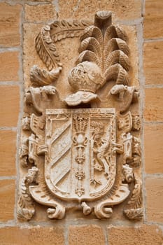 Carved stone coat of arms on the wall, Labastida, Alava, Spain