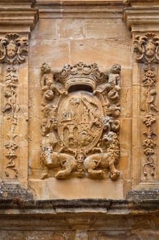 Carved stone coat of arms on the wall, Labastida, Alava, Spain