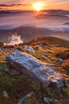 Mountains over the fog in the winter sunrise, Bizkaia, Spain